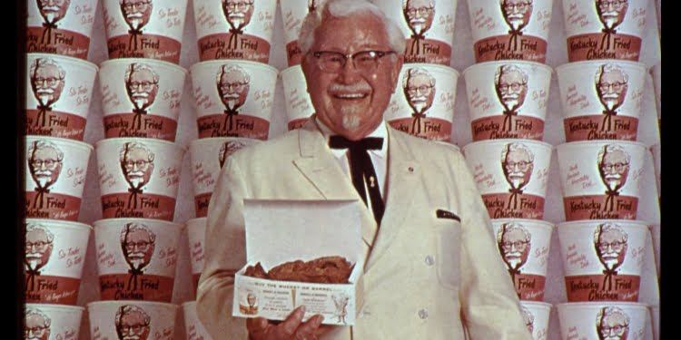 Que une al fundador de KFC con Mark Cuban