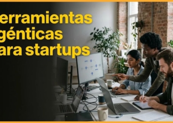 Fundadores de una startup usando herramientas agénticas de IA en una laptop
