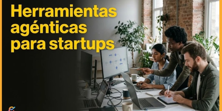 Fundadores de una startup usando herramientas agénticas de IA en una laptop